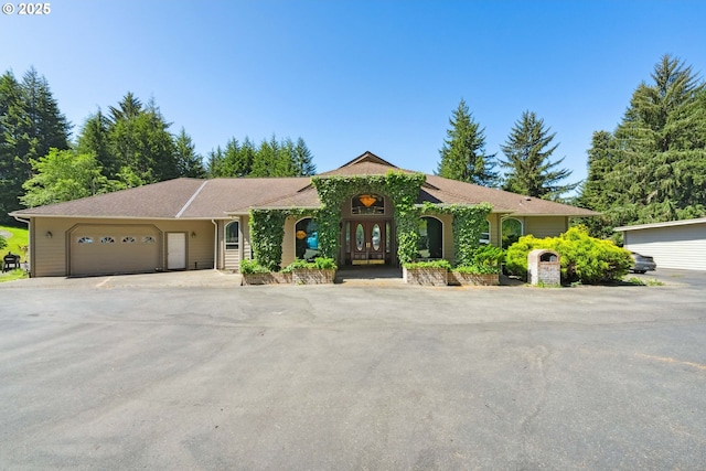 92631 Rainier Ln, Coos Bay, OR 97420 - view of front facade with an attached garage