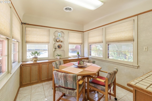 dining area with light tile patterned flooring