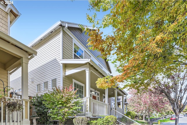 view of home's exterior featuring a porch