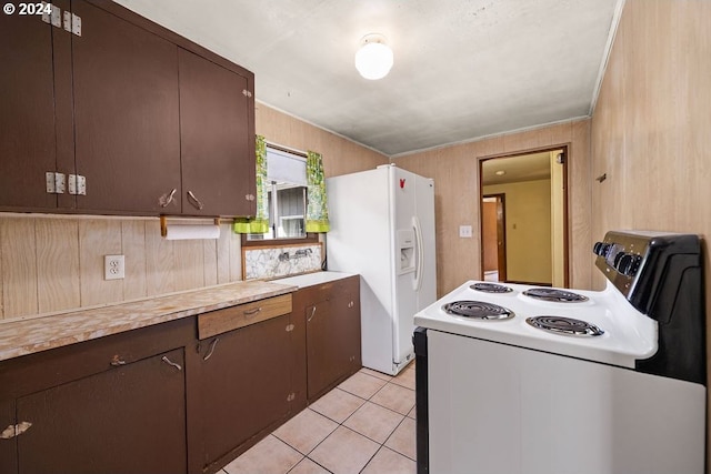 kitchen with dark brown cabinets, light tile patterned floors, white refrigerator with ice dispenser, and electric range