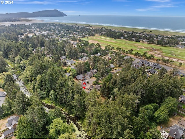 aerial view featuring a water and mountain view