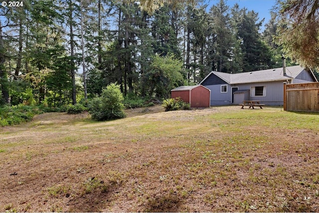 view of yard with a shed