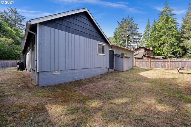 view of home's exterior featuring a yard