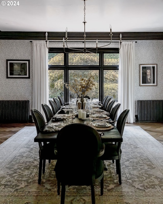 dining area featuring parquet flooring