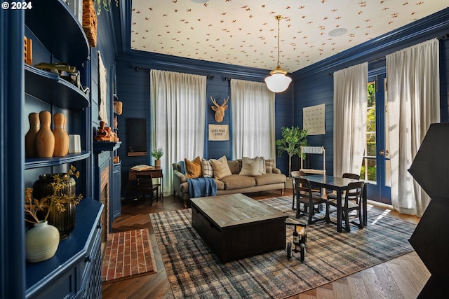 living room with ornamental molding and dark wood-type flooring