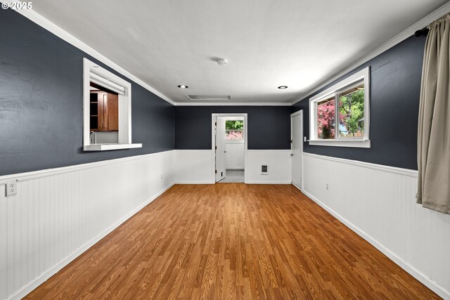 18021 Tualata Ave, Lake Oswego, OR 97035 - spare room featuring a wainscoted wall, wood finished floors, and a smoke detector
