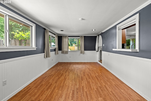 18021 Tualata Ave, Lake Oswego, OR 97035 - empty room with wood finished floors and a wainscoted wall
