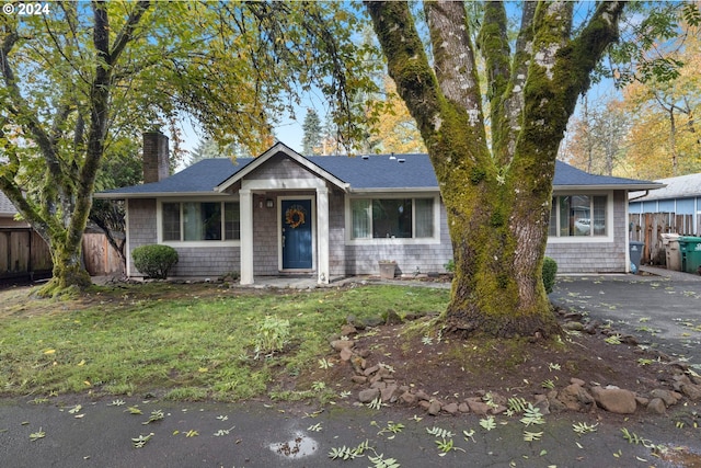 18021 Tualata Ave, Lake Oswego, OR 97035 - view of front of home featuring a chimney and roof with shingles