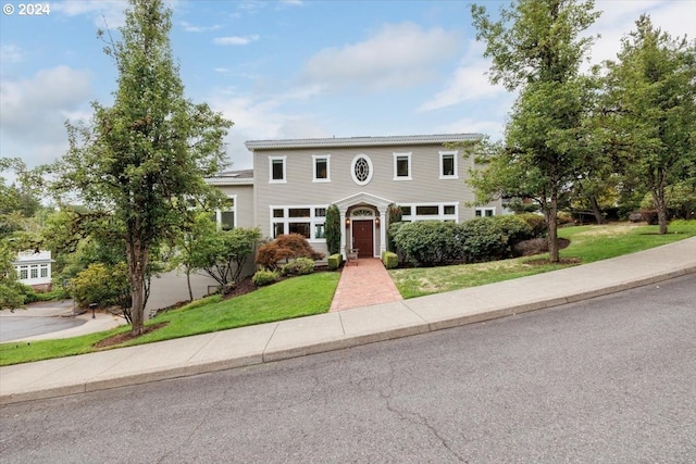 view of front of house featuring a front lawn