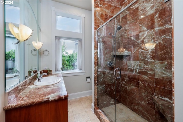 bathroom with vanity and walk in shower