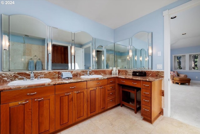 bathroom with vanity and walk in shower