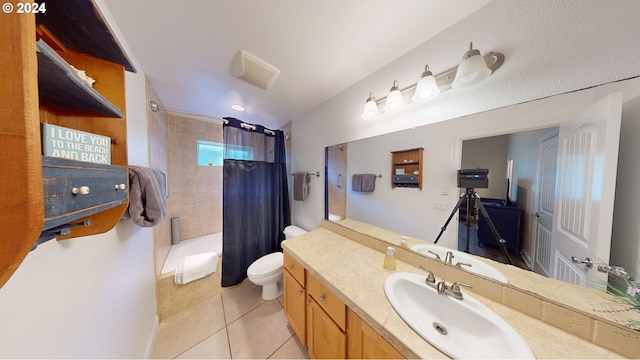 full bathroom featuring tile patterned flooring, vanity, shower / tub combo with curtain, and toilet