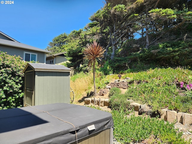 exterior space featuring a hot tub