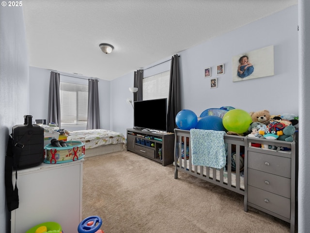 bedroom with multiple windows and carpet flooring