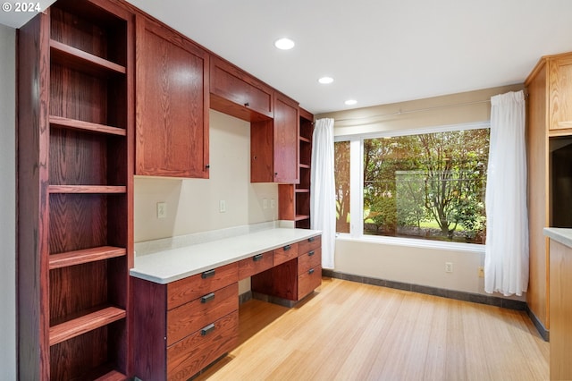 549 N Tomahawk Island Dr # 1, Portland, OR 97217 - unfurnished office featuring baseboards, built in study area, recessed lighting, and light wood-style floors