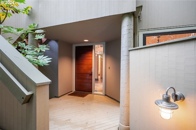 doorway to property with a wooden deck