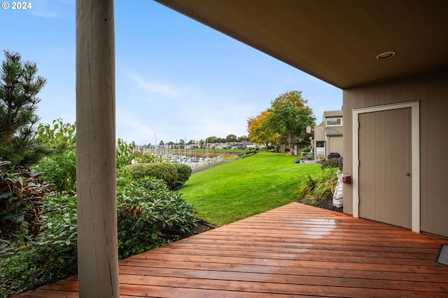 deck featuring a lawn