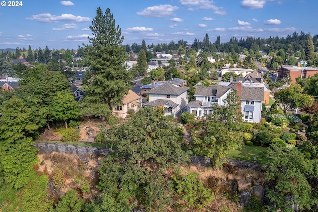 birds eye view of property with a residential view