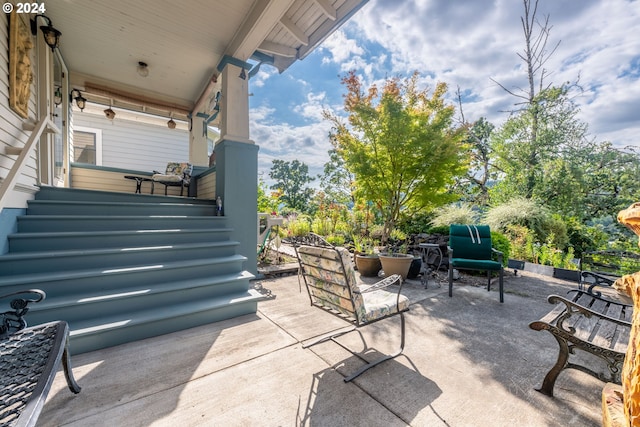 view of patio / terrace featuring stairs