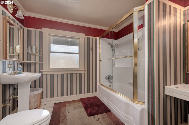 full bathroom with wallpapered walls, baseboards, bath / shower combo with glass door, toilet, and crown molding