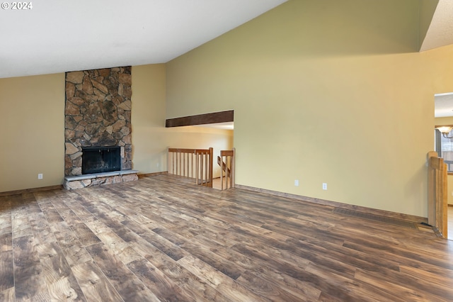 unfurnished living room with a fireplace, hardwood / wood-style flooring, and high vaulted ceiling