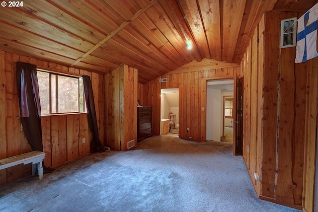 bonus room featuring wood ceiling, vaulted ceiling, light colored carpet, and wood walls