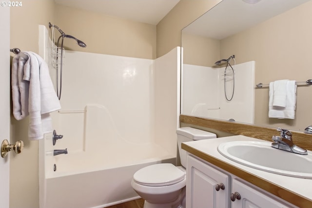 full bathroom with toilet, vanity, and tub / shower combination