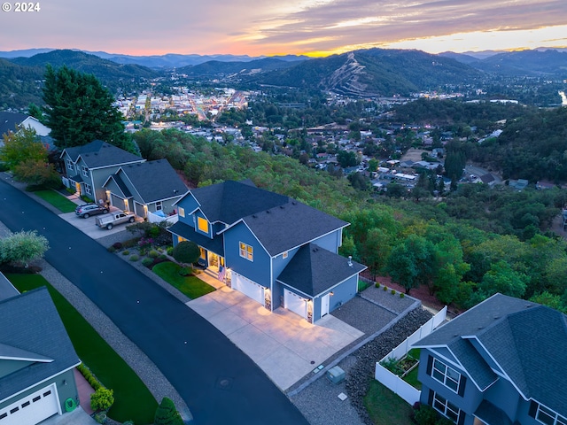 bird's eye view with a residential view and a mountain view