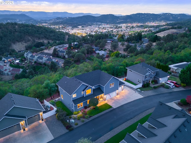 aerial view featuring a mountain view and a residential view