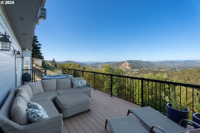 balcony with a mountain view and outdoor lounge area