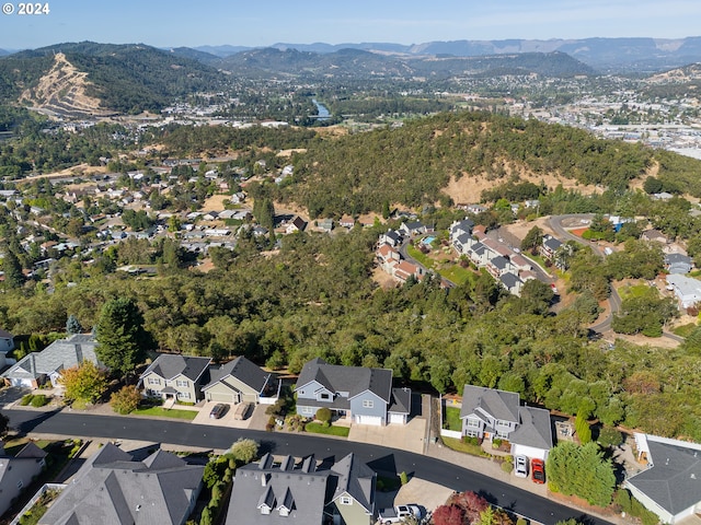 birds eye view of property featuring a residential view and a mountain view