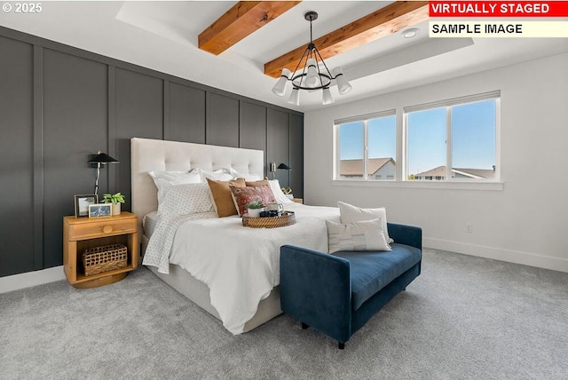 3825 S Arwana Ln, Ridgefield, WA 98642 - bedroom with a chandelier, light colored carpet, beamed ceiling, and baseboards