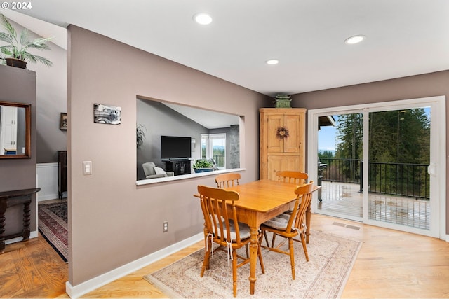 dining space featuring light hardwood / wood-style floors