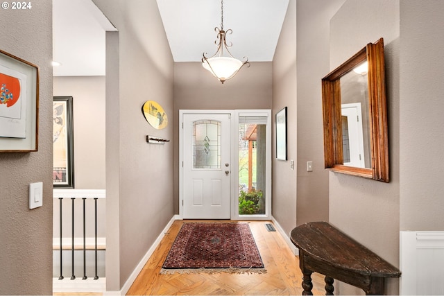 entryway with lofted ceiling