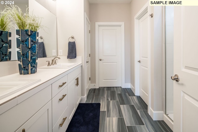 bathroom featuring vanity, walk in shower, and hardwood / wood-style floors