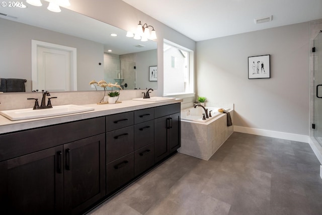 bathroom featuring vanity, concrete floors, and shower with separate bathtub