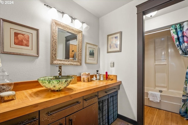 bathroom featuring vanity and wood-type flooring