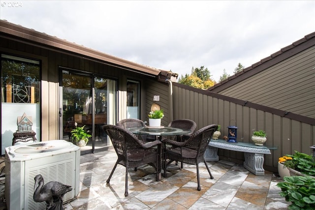 view of patio with central AC unit