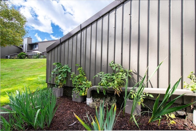 view of home's exterior featuring a yard