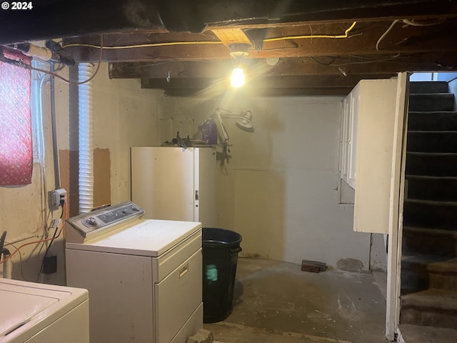 washroom with washer / clothes dryer