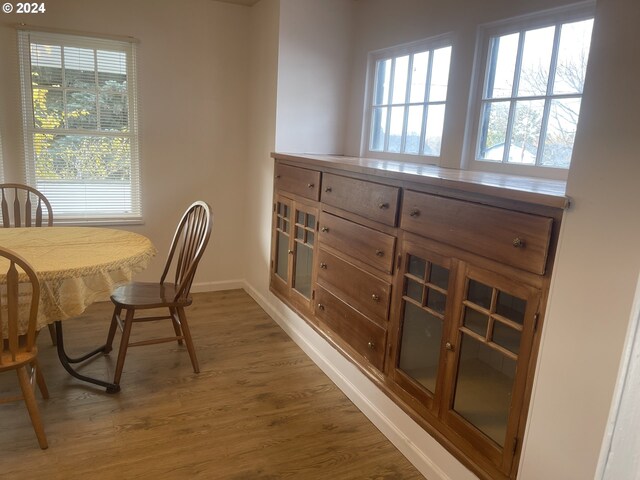240 N Court St, Heppner, OR 97836 - dining space featuring wood finished floors, plenty of natural light, and baseboards