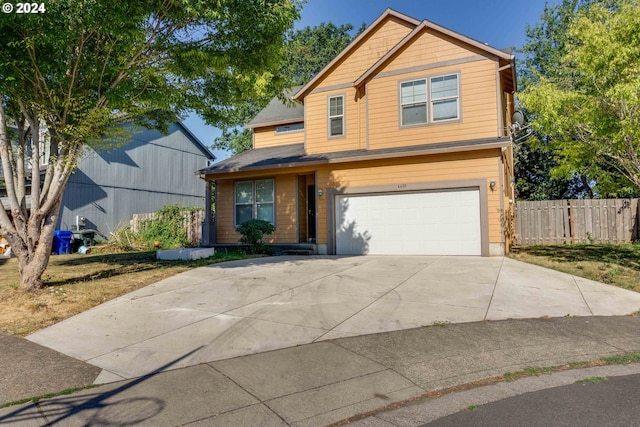 view of front of property featuring a garage