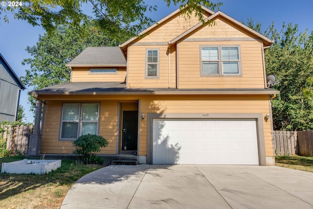 view of front of home with a garage