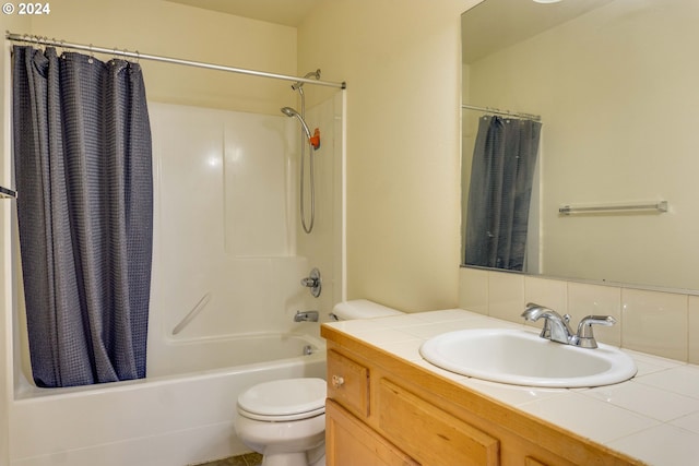 full bathroom with decorative backsplash, vanity, toilet, and shower / bath combo with shower curtain