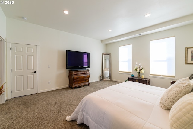 carpeted bedroom featuring recessed lighting and baseboards