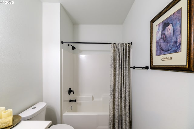 bathroom featuring vanity, toilet, and shower / tub combo with curtain