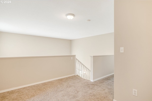 corridor featuring carpet flooring