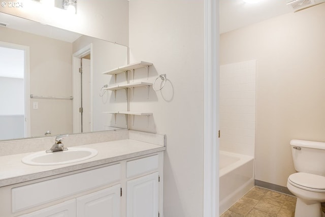 full bathroom featuring vanity, tub / shower combination, and toilet