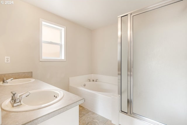 bathroom with vanity and plus walk in shower