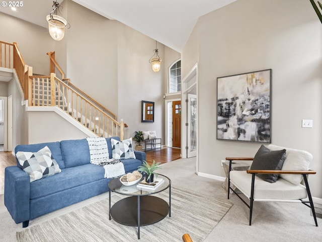 carpeted living room with lofted ceiling